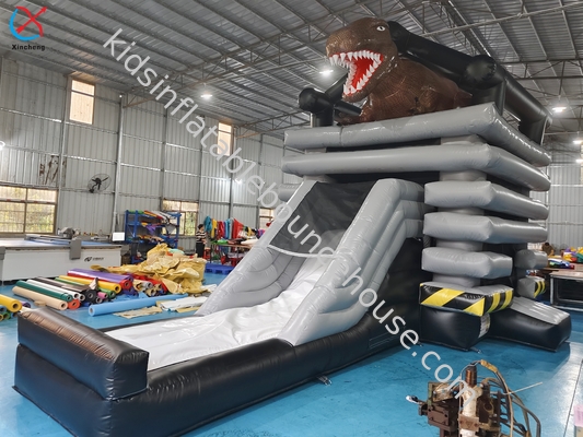 Nuovo design di castello gonfiabile con diapositiva a tema dinosauro commerciale
